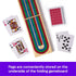 Top view of a folding wooden Cribbage board with red, blue, and green tracks, surrounded by playing cards, highlighting the convenient peg storage built into the underside of the board.