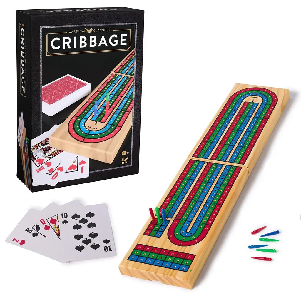 Full view of the Cardinal Classics Cribbage set showing the game’s packaging, folding wooden board, playing cards, and colored scoring pegs for 2–4 players aged eight and older.