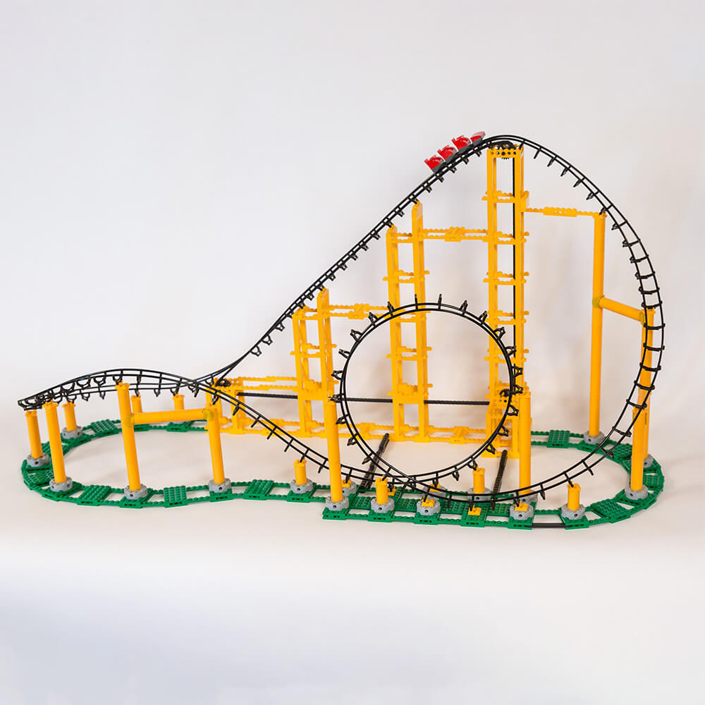 The CDX Blocks The Sidewinder Roller Coaster 825 Piece Building Kit is featured with yellow support pieces and black tracks.