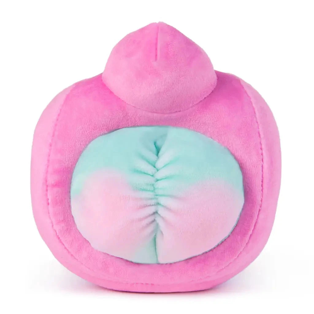 Rear view of a plush crab toy revealing a pastel pink and teal cinched bottom, surrounded by a pink plush shell, highlighting the toy’s reversible and cheeky design.