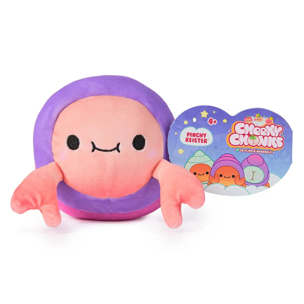 Front-facing image of Cheeky Chonks Pinchy Keister 6-inch plush toy showing smiling crab character with claws and product tag shaped like a heart with brand graphics.