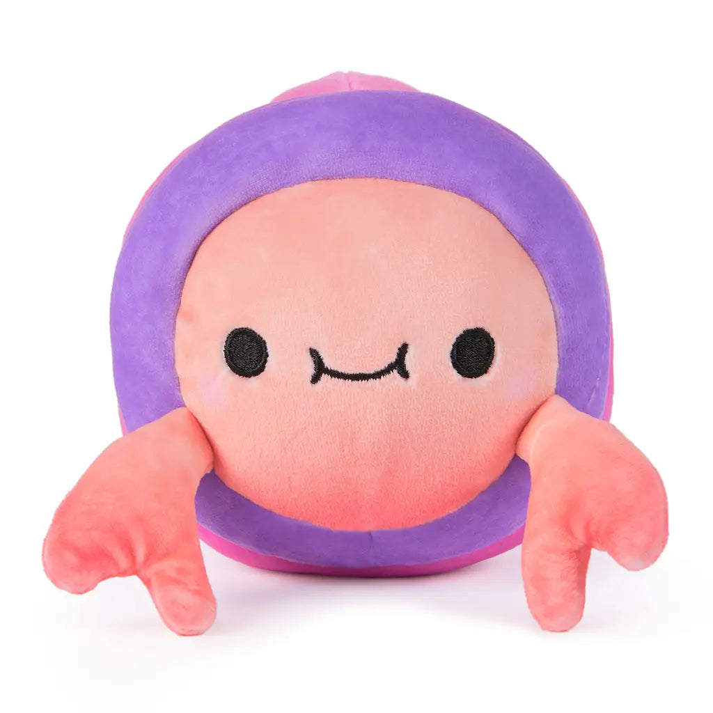 Front view of a reversible 6-inch plush toy shaped like a crab with pink claws, peach face, and purple shell, designed with a smiling expression and soft fabric texture.