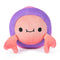 Front view of a reversible 6-inch plush toy shaped like a crab with pink claws, peach face, and purple shell, designed with a smiling expression and soft fabric texture.