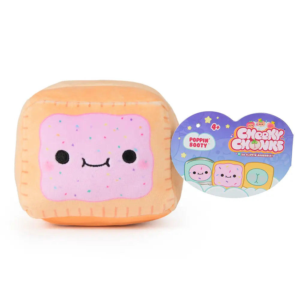 Cheeky Chonks Poppin Booty 6-inch reversible plush with product tag, featuring a smiling pink frosted pastry face with colorful sprinkles and stitched crust design.