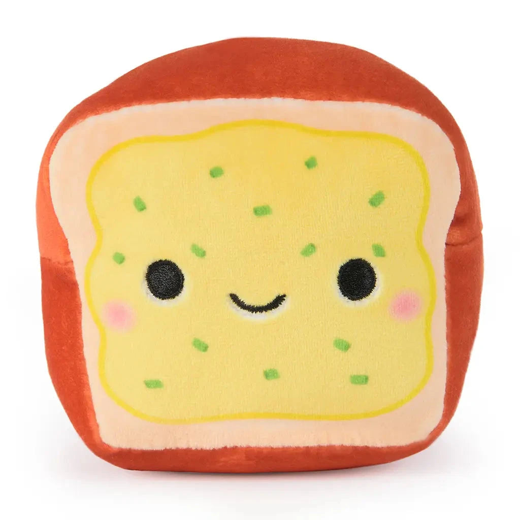 Front view of Cheeky Chonks Rearly Garlicky 6-inch plush, featuring a happy embroidered face on a yellow garlic bread slice with green sprinkles and a brown crust.