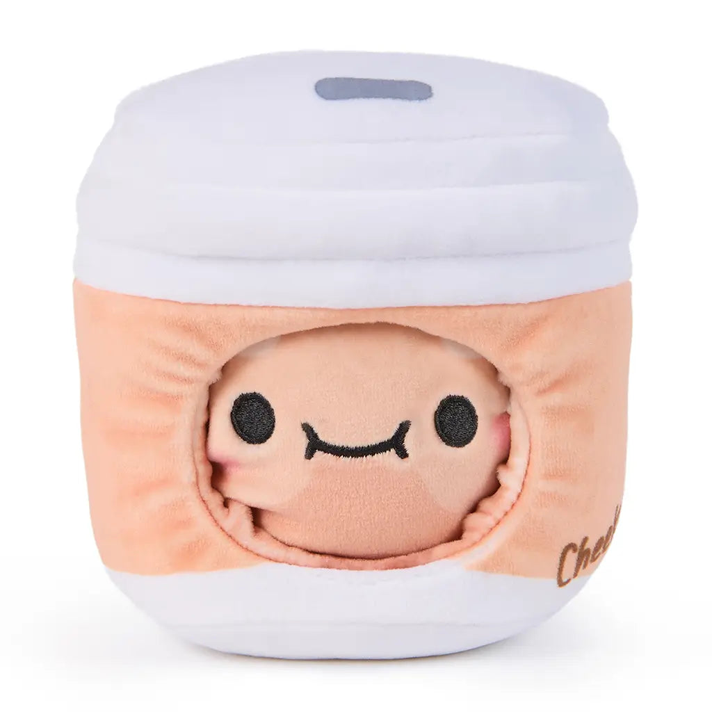 Soft, 6-inch reversible plush toy shaped like a smiling roasted dumpling inside a peach and white bubble tea cup with embroidered face and cheeky design.