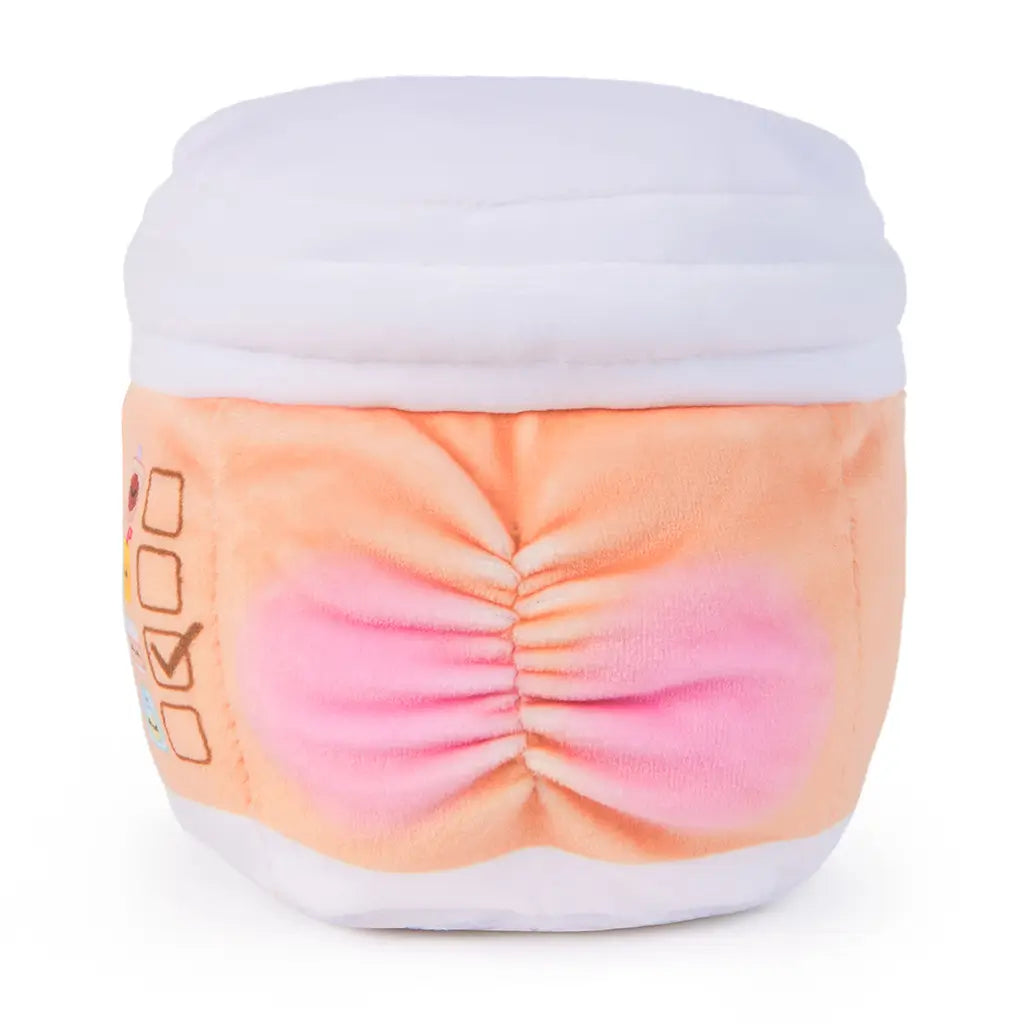 Rear view of a reversible bubble tea plush toy showing pink and orange plush fabric shaped like a cartoon bottom, with soft white lid and colorful side details.