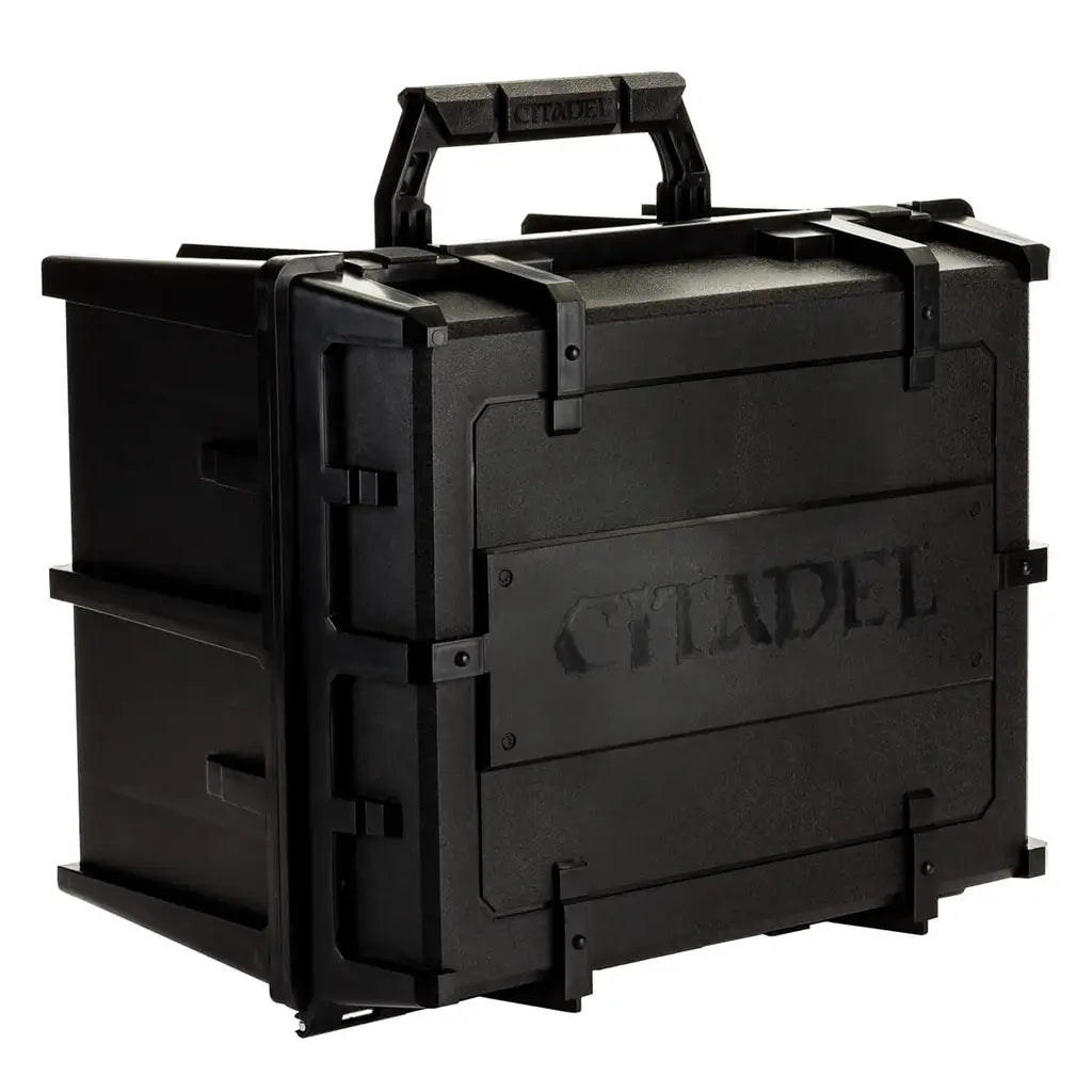 Citadel Battle Figure Case with matte black hard plastic exterior, textured durable surfaces, rectangular storage case shape with reinforced corners, secure latches and carry handle, used for storage.