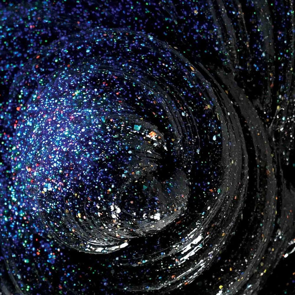 Close up of the putty from the  Crazy Aaron's Cosmic Glows Star Dust Thinking Putty 4" Tin