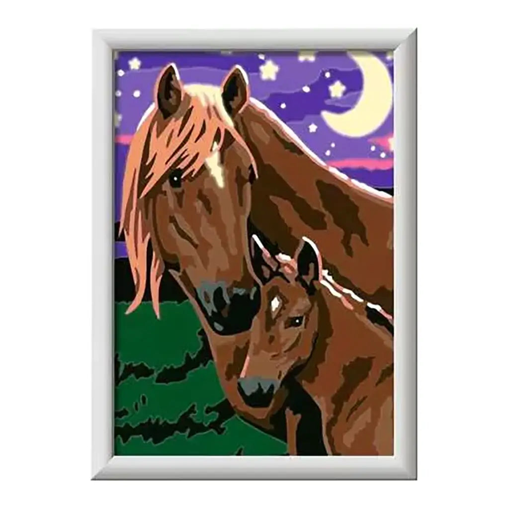 Completed CreArt “Horses at Midnight” painting showing a mare and foal in dark brown tones against purple starry night sky with crescent moon, framed in white.