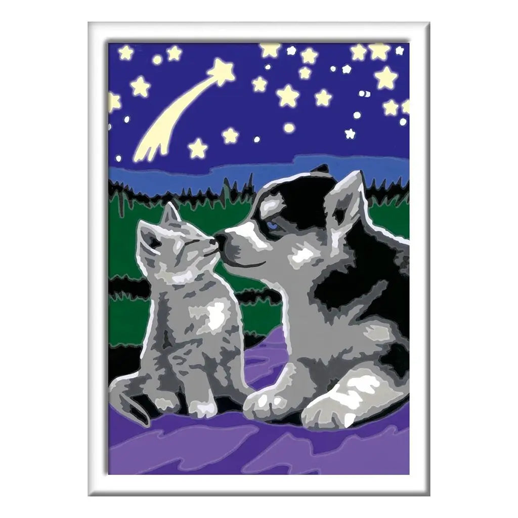 Finished CreArt “Moonlight Friends” painting featuring a gray kitten and black-and-white puppy gazing at each other under a starry night sky with a glowing shooting star.