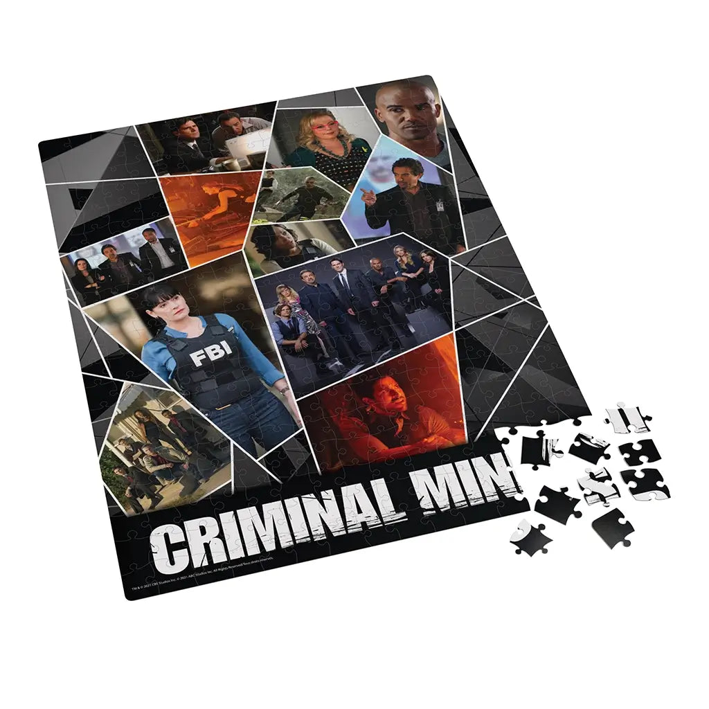 Criminal Minds jigsaw puzzle glossy cardboard surface featuring character collage in geometric layout, partially assembled rectangular puzzle with loose pieces, displayed on clean white background.