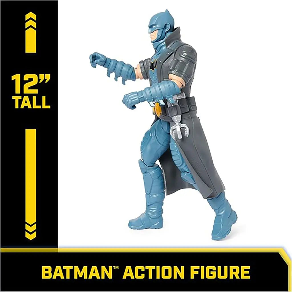 DC Comics Batman 12-inch action figure in gray trench coat and blue armored suit, posed mid-stride with highlighted scale text showing height measurement.