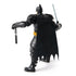 Rear view of Batman Ninja Strike action figure showing black cape and pink weapons in hand, highlighting the toy’s detailed sculpting and articulated limbs.