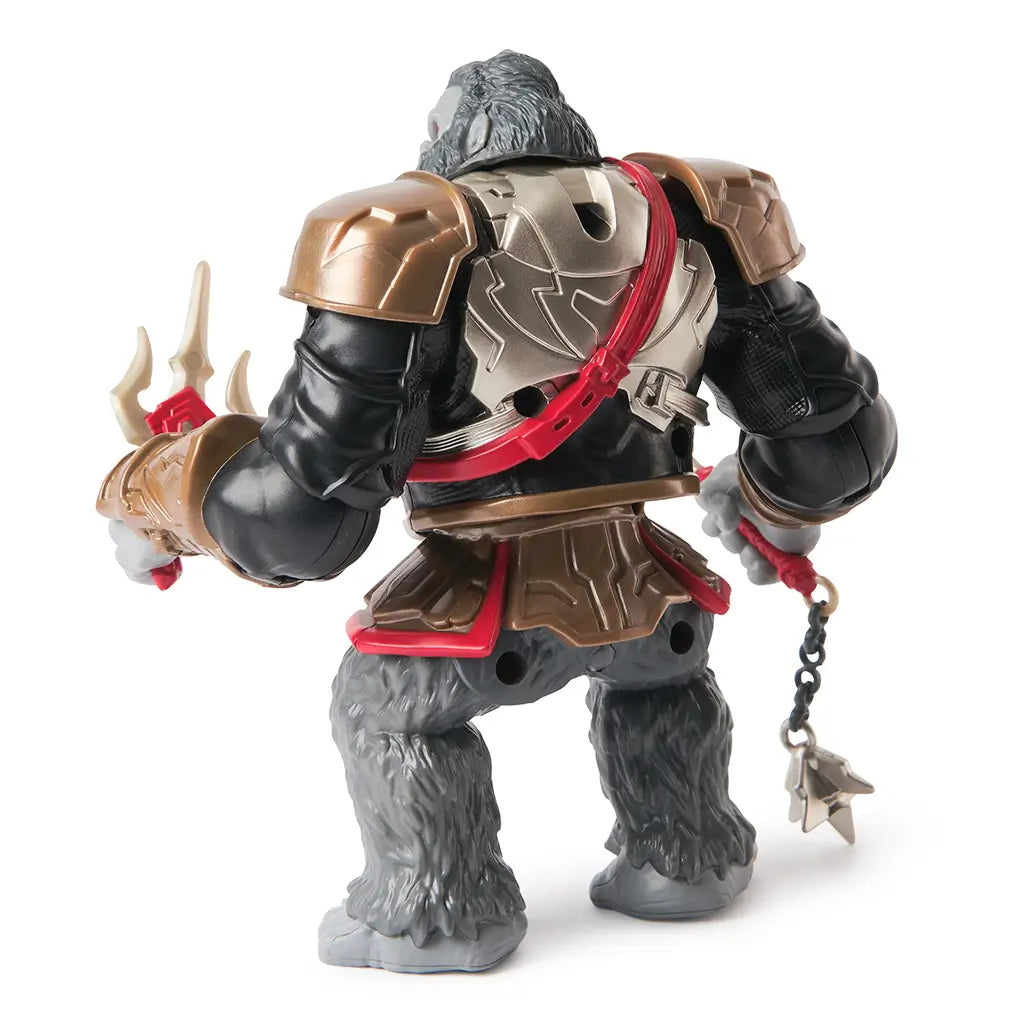Rear view of Gorilla Grodd action figure showing sculpted gold back armor, red strap, and detailed fur texture, with weapon in hand and articulated limbs.