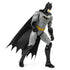 DC Comics Batman 12-inch action figure in gray and black costume with yellow belt and flowing cape, displayed in a dynamic crouching pose to highlight articulation on white background.