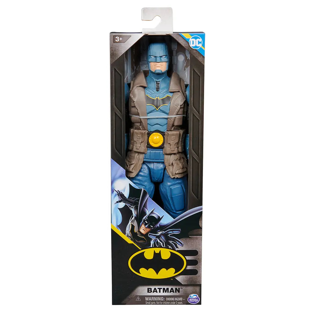 Post-apocalypse Batman 12-inch action figure in branded packaging, featuring rugged design with blue armor and yellow belt, safe for children ages 3 and up.