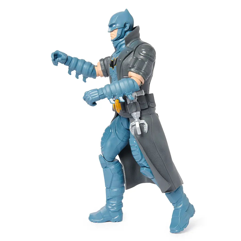 Steampunk-style Batman action figure in combat stance, featuring blue armor, trench coat, utility belt, and grappling hook, designed for dynamic play.