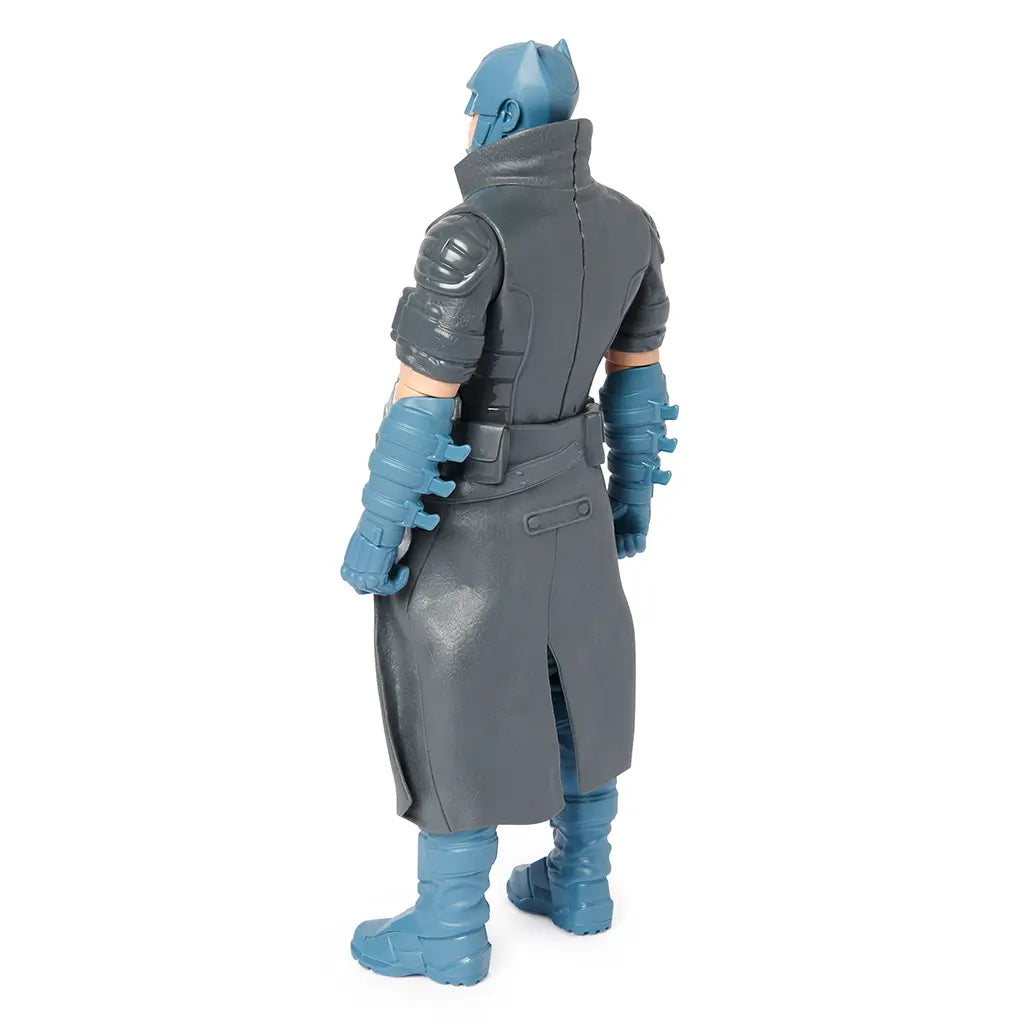 Rear view of steampunk Batman action figure showing long grey trench coat, detailed gloves, and back armor design, crafted for action and display.
