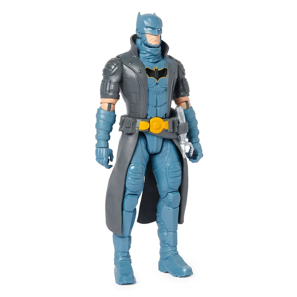 Angled view of DC Comics Steampunk Batman 12-inch action figure, detailed in blue body armor, gray trench coat, and yellow utility belt.