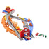 Disney Pixar Cars raceway playset illustrates two play modes using red and blue plastic tracks, a checkered flag gate, molded desert scenery, and character cars racing or rescuing in Radiator Springs.