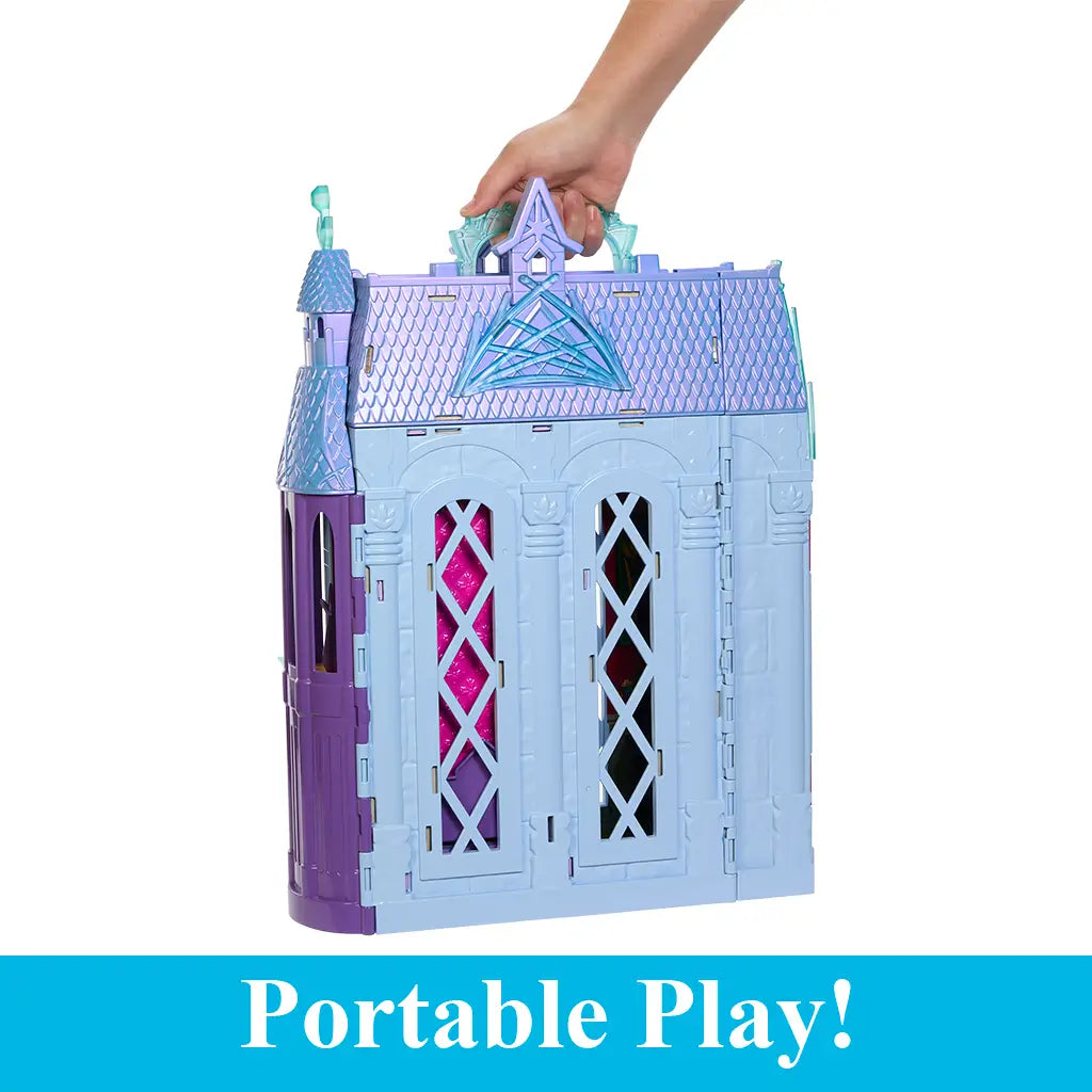 Folded Disney Frozen Arendelle Castle playset in light blue with purple accents, compact design featuring carry handle on top, shown for easy portable play storage.