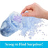 Close-up of a hand scooping through blue squishy ice gel to uncover a glittery purple snowflake accessory from the Disney Frozen Ice Reveal surprise toy playset.
