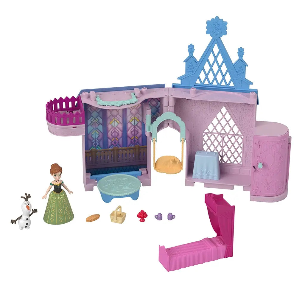Disney Frozen Storytime Stackers Anna’s Arendelle Castle set includes pink and blue castle playhouse, Anna and Olaf figures, bed, swing, table, and miniature play accessories.