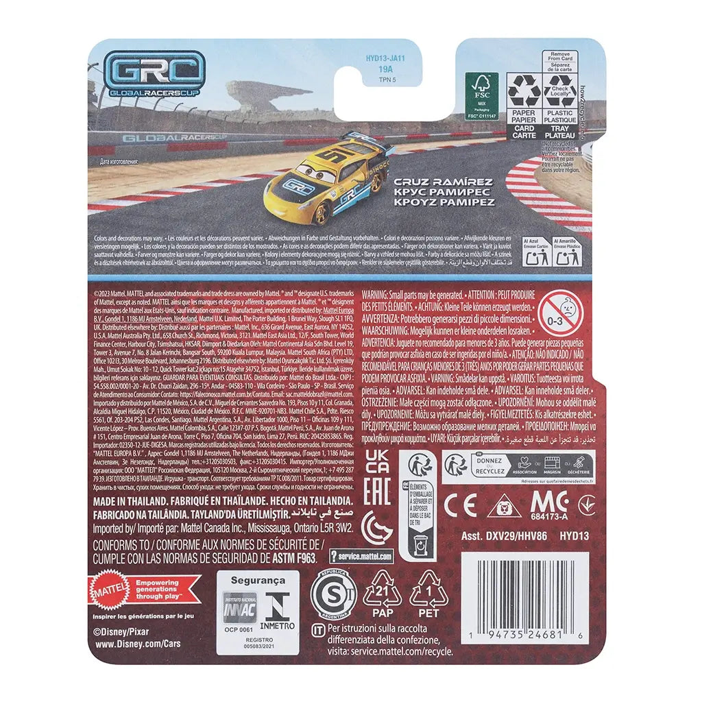 Back of Disney Pixar Cars GRC 51 Cruz Ramirez packaging with race track backdrop, product details, recycling icons, and small image of yellow race car diecast model in Global Racers Cup theme.