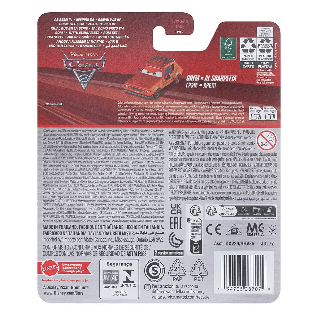 Back of Disney Pixar Cars diecast Grem packaging, showing red design with movie artwork, character bio in multiple languages, safety warnings, barcode, and official Mattel branding.