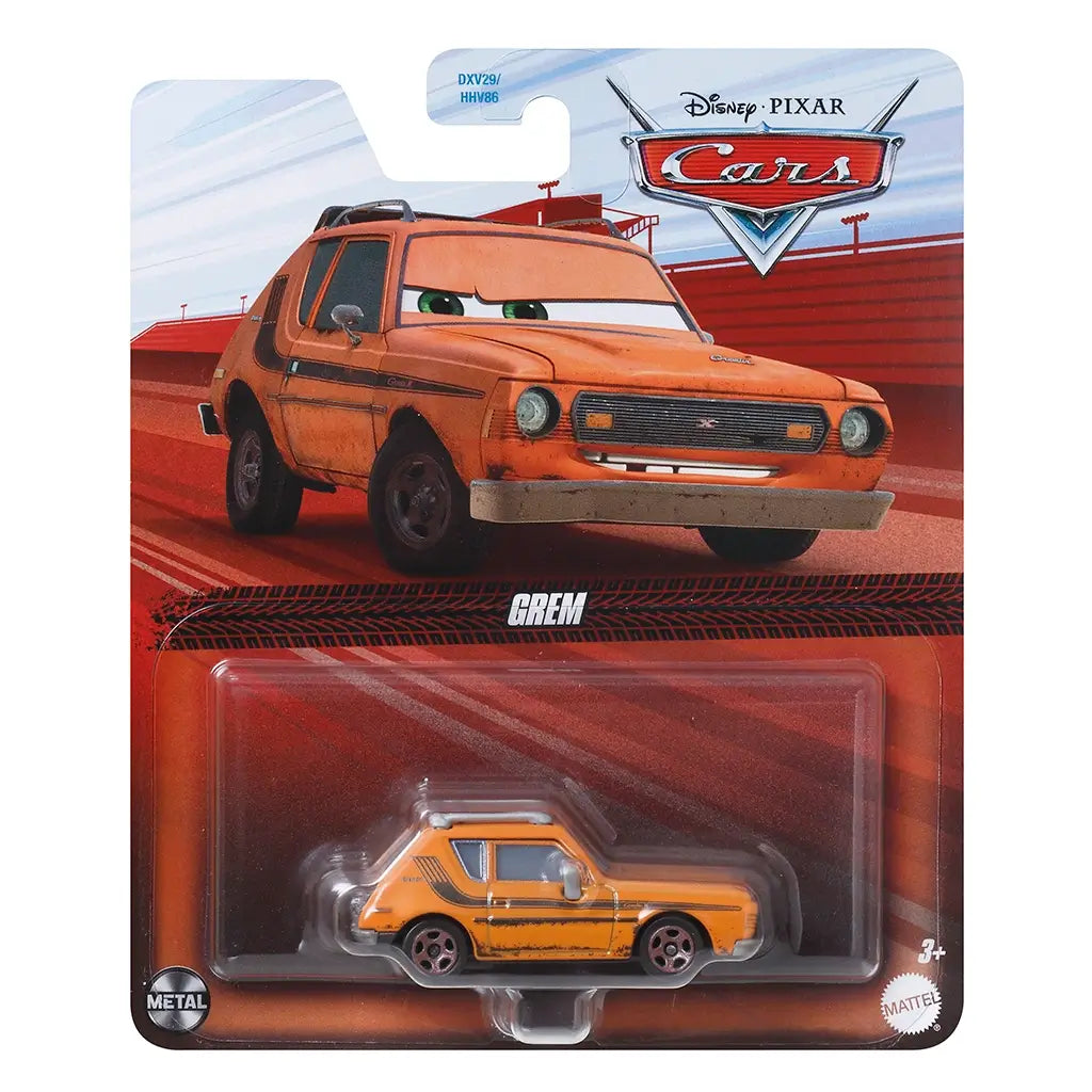Front packaging of Disney Pixar Cars diecast Grem toy, featuring illustrated character art above clear blister pack with orange car inside, marked with Cars logo and Mattel branding.