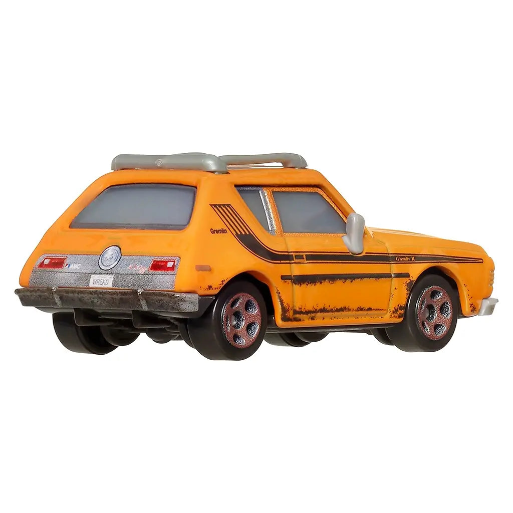 Disney Pixar Cars Grem diecast toy car in bright orange metal with black side stripes, worn rust details, and chrome accents, shown from a rear angled view on a white background.