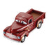 Disney Pixar Cars Heyday Smokey diecast pickup shown from a top angled view, highlighting the deep red glossy metal cab, rounded roofline, open bed detail, silver trim accents, and flame graphics, photographed cleanly against a white background.