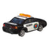 Disney Pixar Cars diecast security car shown from a rear angled view, featuring black and white metal body, amber roof light bar, compact trunk design, silver wheels, and Piston Cup emblem, portraying Marlon “Clutches” McKay on a white background.