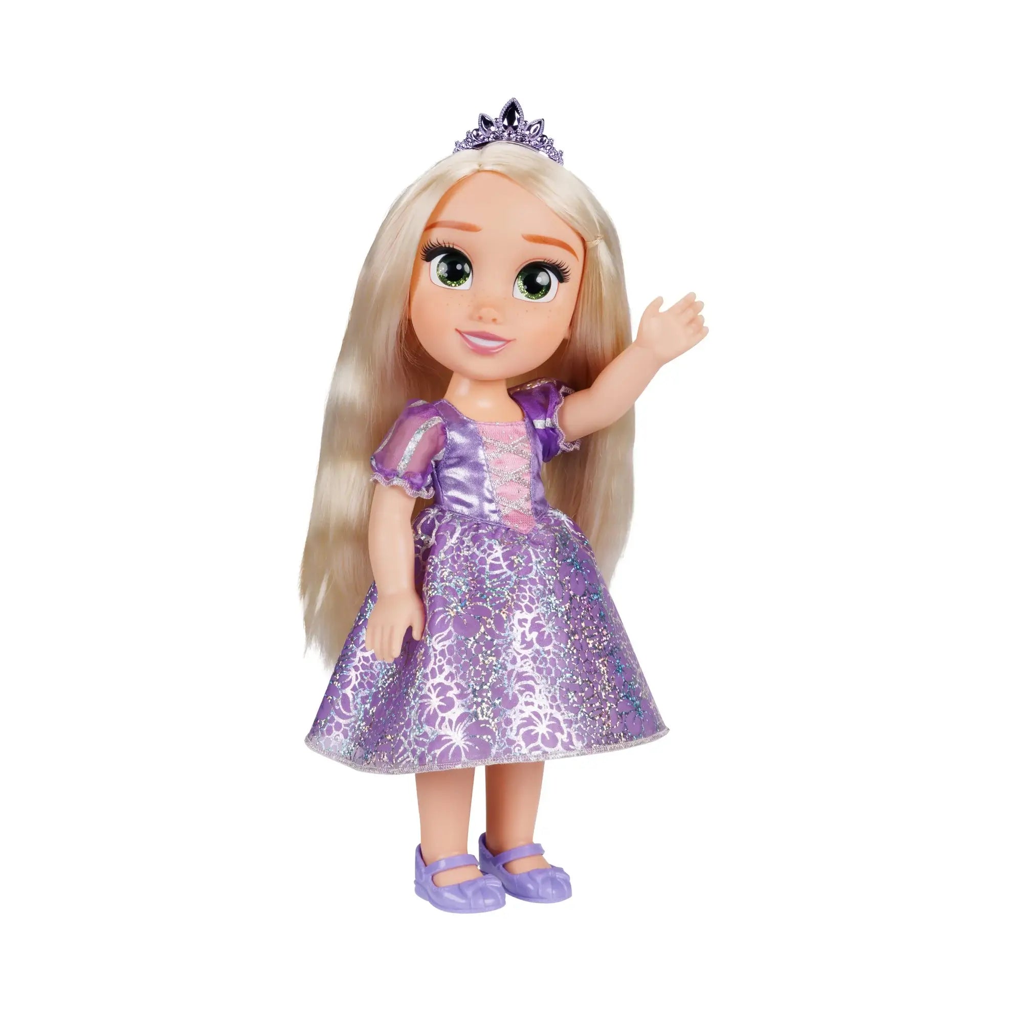 Disney Princess Rapunzel doll in a purple satin-look floral gown, jeweled tiara, lavender shoes, and long blonde hair, smiling and waving on a white background.