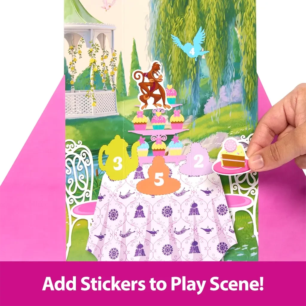Hand placing stickers on illustrated tea party scene from Disney Princess Spin & Reveal Jasmine set for creative storytelling.