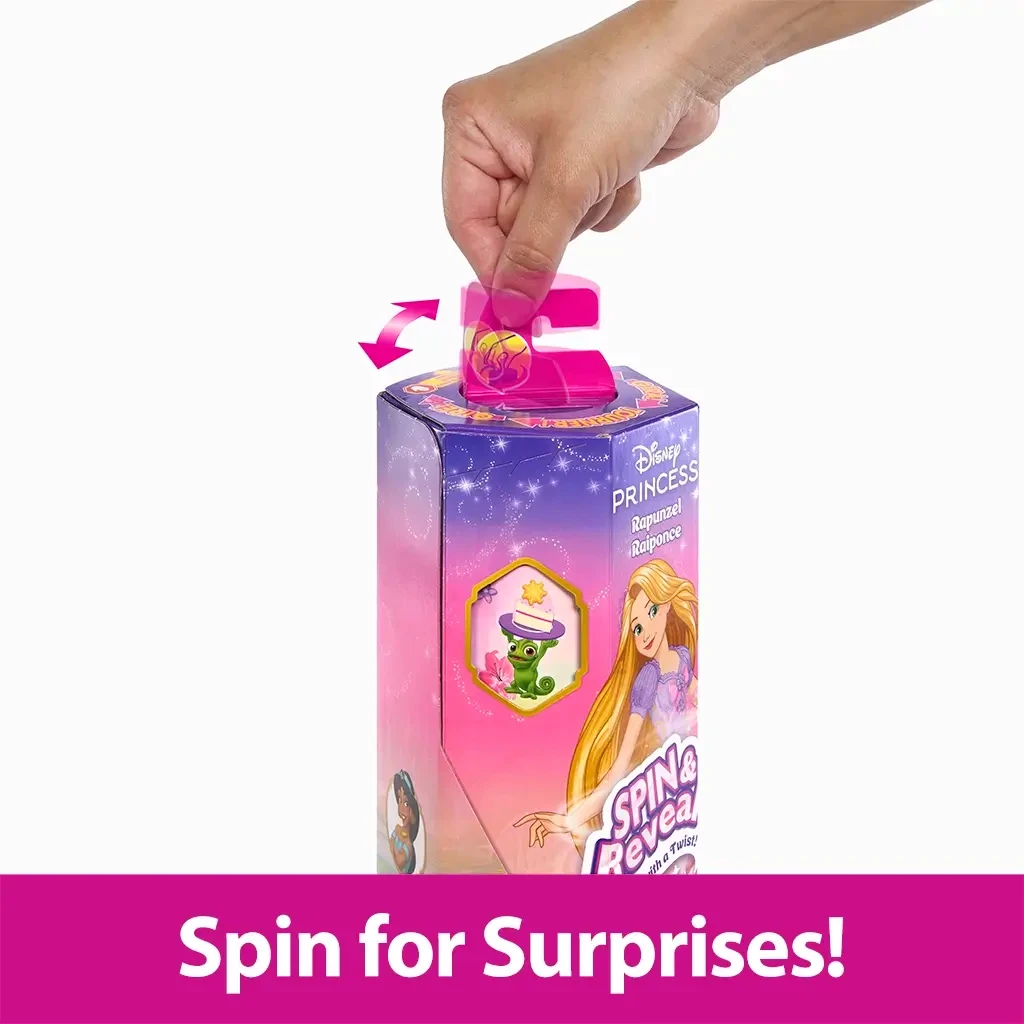 Hand turning the bright pink spinning handle on top of the Disney Princess Rapunzel Spin & Reveal box to activate the surprise-revealing mechanism.