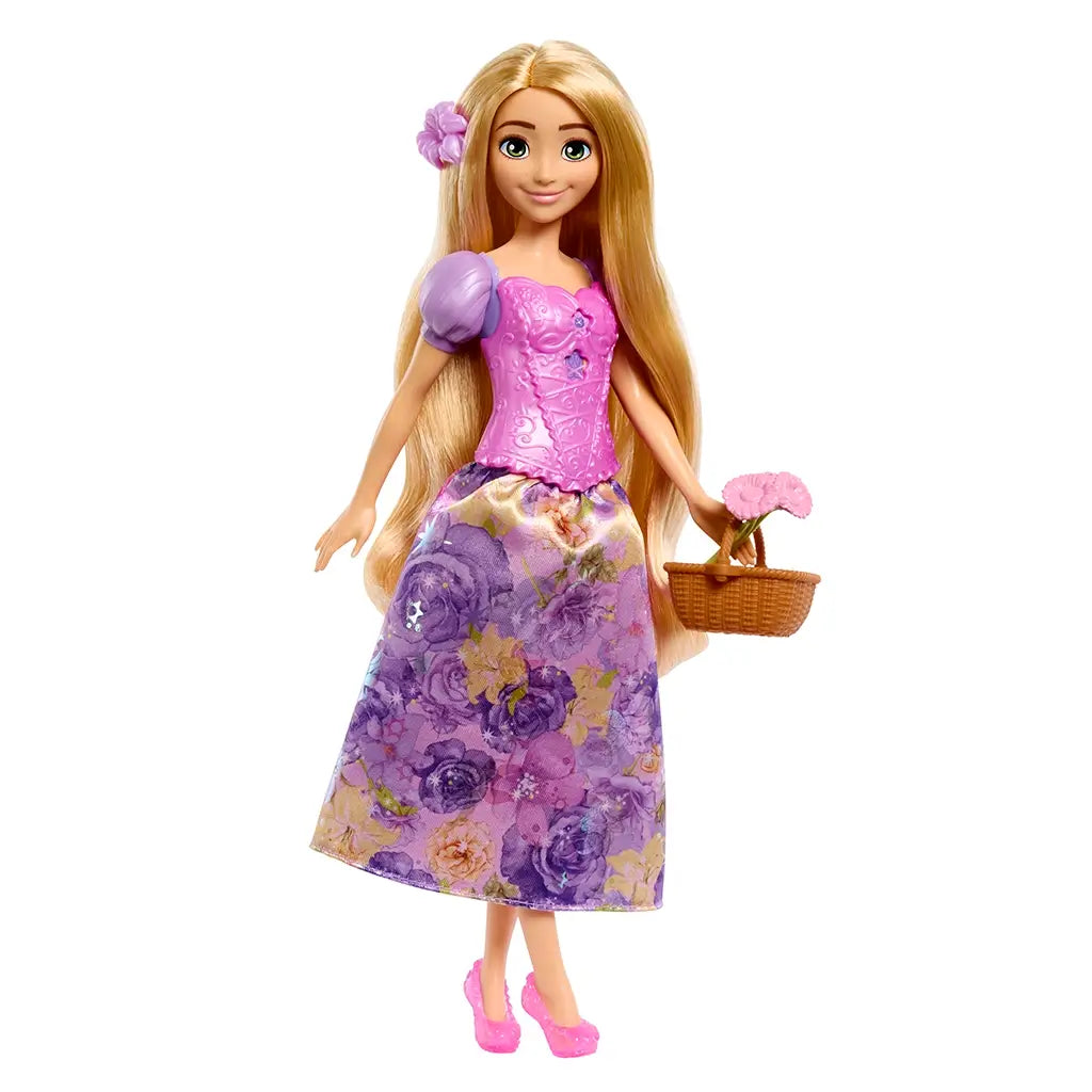 Disney Princess Rapunzel doll with long blonde hair wears a purple and pink floral dress, pink shoes, and holds a woven basket with pink flowers in one hand.