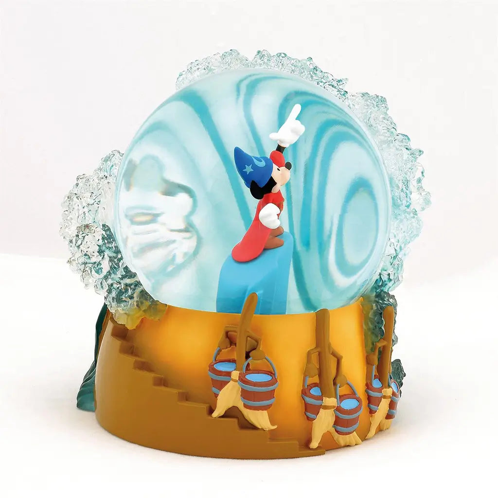 Front view of Sorcerer Mickey inside waterball with staircase and enchanted brooms, set atop a detailed base; part of Disney Showcase Fantasia 85th anniversary series.