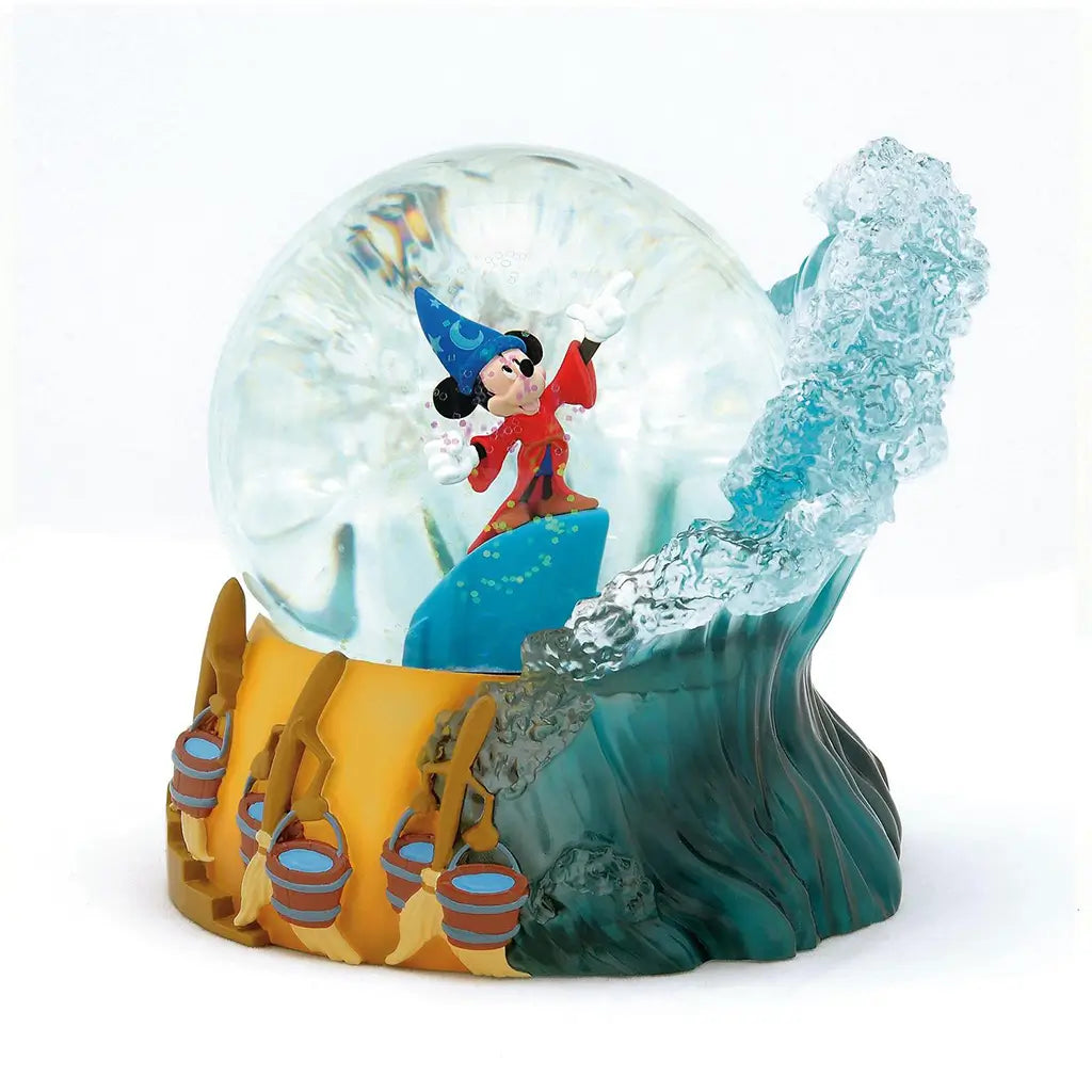 Shaken view of Fantasia waterball showing glitter swirling around Sorcerer Mickey, surrounded by sculpted waves and enchanted broomsticks; Disney 85th collectible.