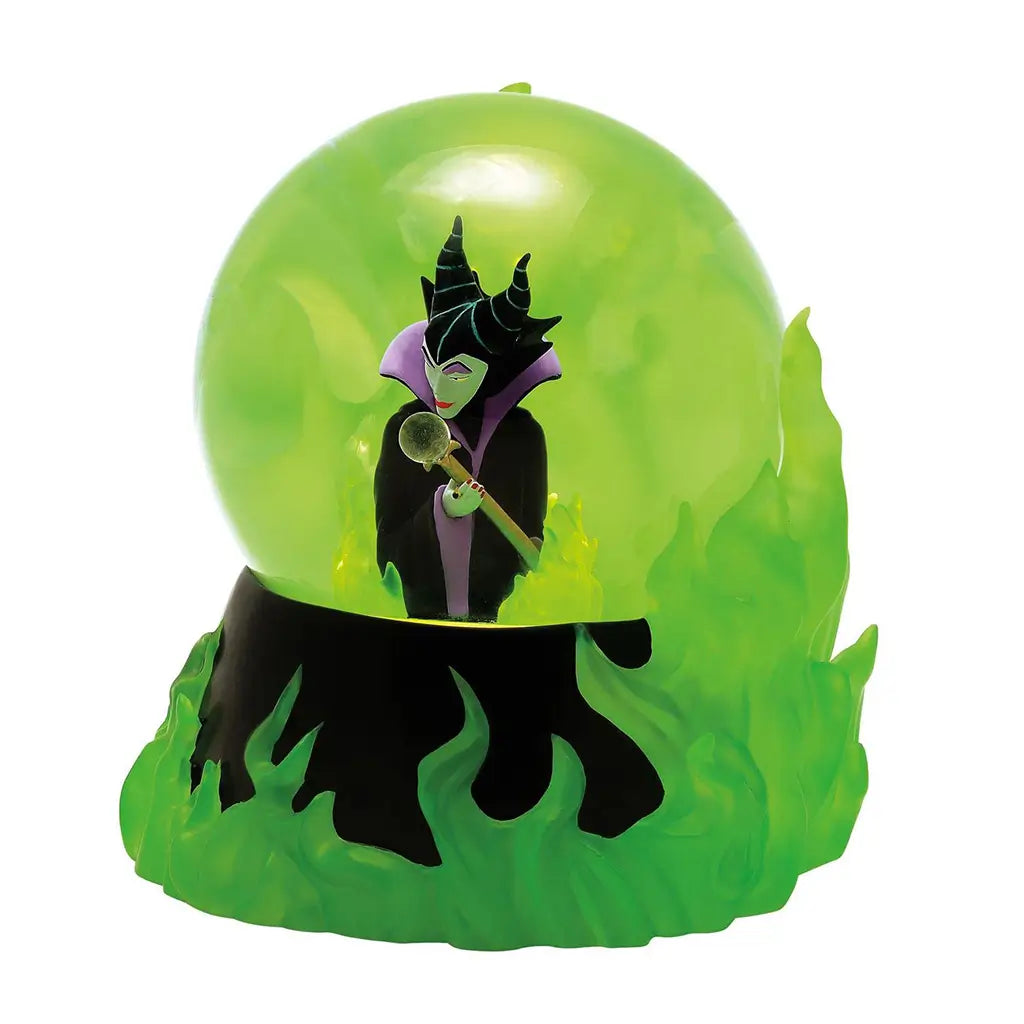 Front view of Maleficent waterball figure in green swirling flames holding a glowing orb, encased in dome; collectible from Disney Showcase villain series.