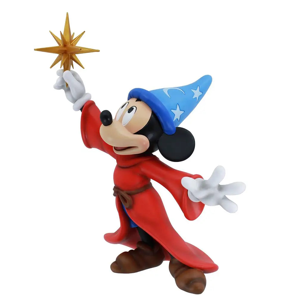 Side profile of Sorcerer Mickey 10-inch figurine with raised wand and flowing robe, wearing signature Fantasia blue hat; detailed piece from Disney Showcase collection.