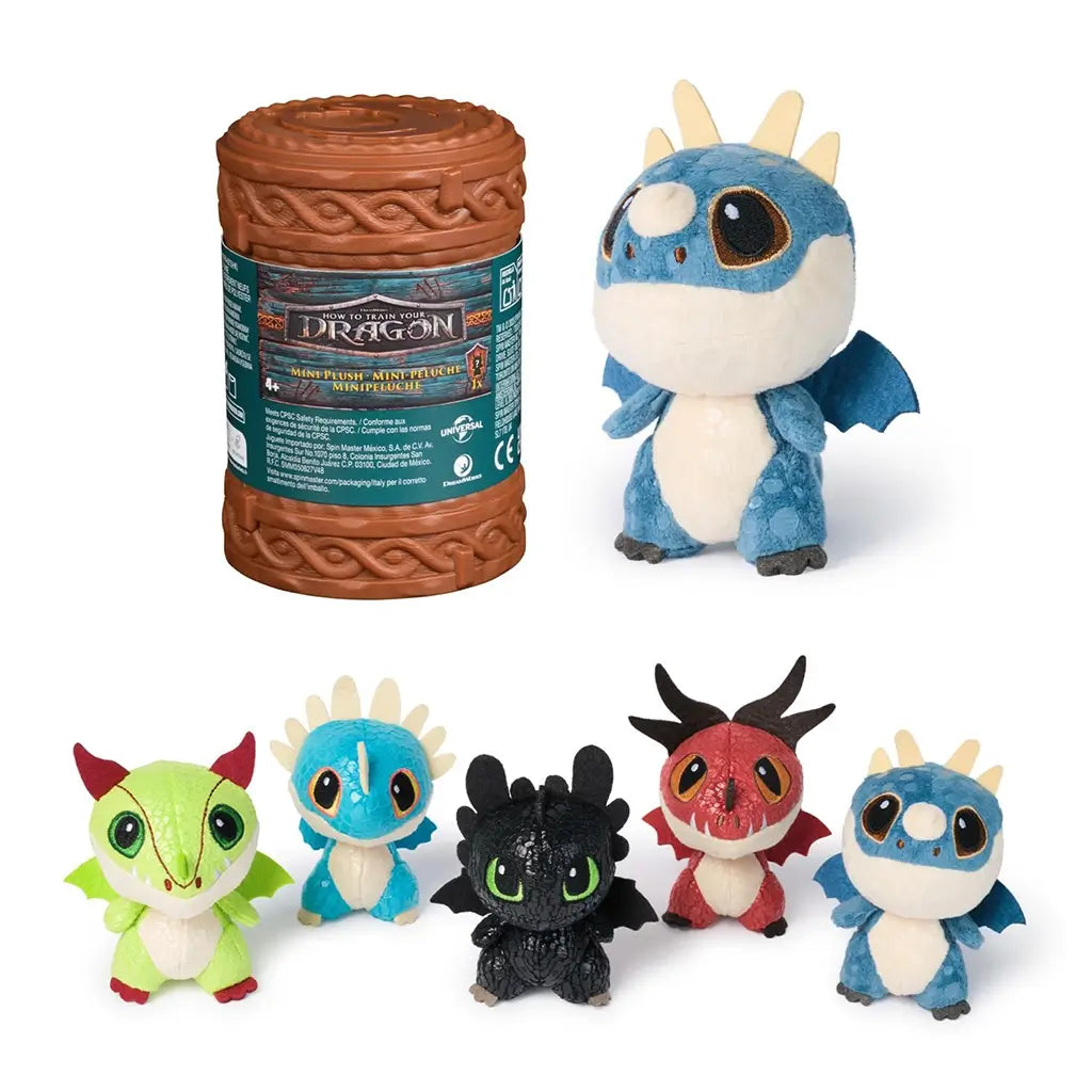 DreamWorks How to Train Your Dragon mini plush set in blue, green, red, and black textured fabric with round shapes and small wings, displayed beside branded brown capsule packaging on white background.
