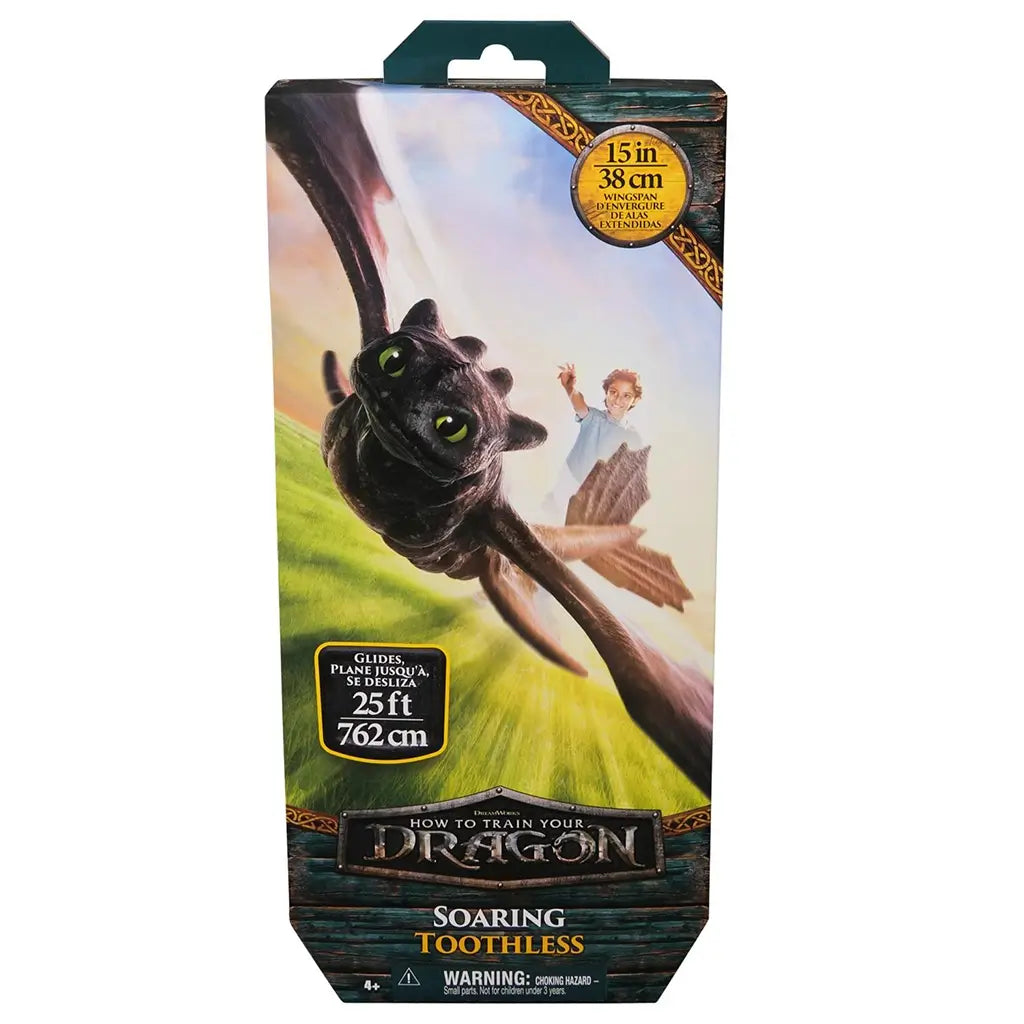 Front view of DreamWorks How to Train Your Dragon Soaring Toothless packaging featuring artwork of Toothless mid-flight with Hiccup and product details on wingspan and flight distance.