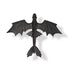 Top view of the DreamWorks Toothless glider toy showing full 15-inch wingspan, wide tail fins, and black textured surface for realistic flying play.