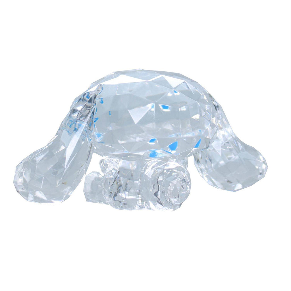 Rear view of faceted crystal Cinnamoroll figurine showing its sculpted ears, head, and body; clear collectible toy modeled after Sanrio’s mascot.