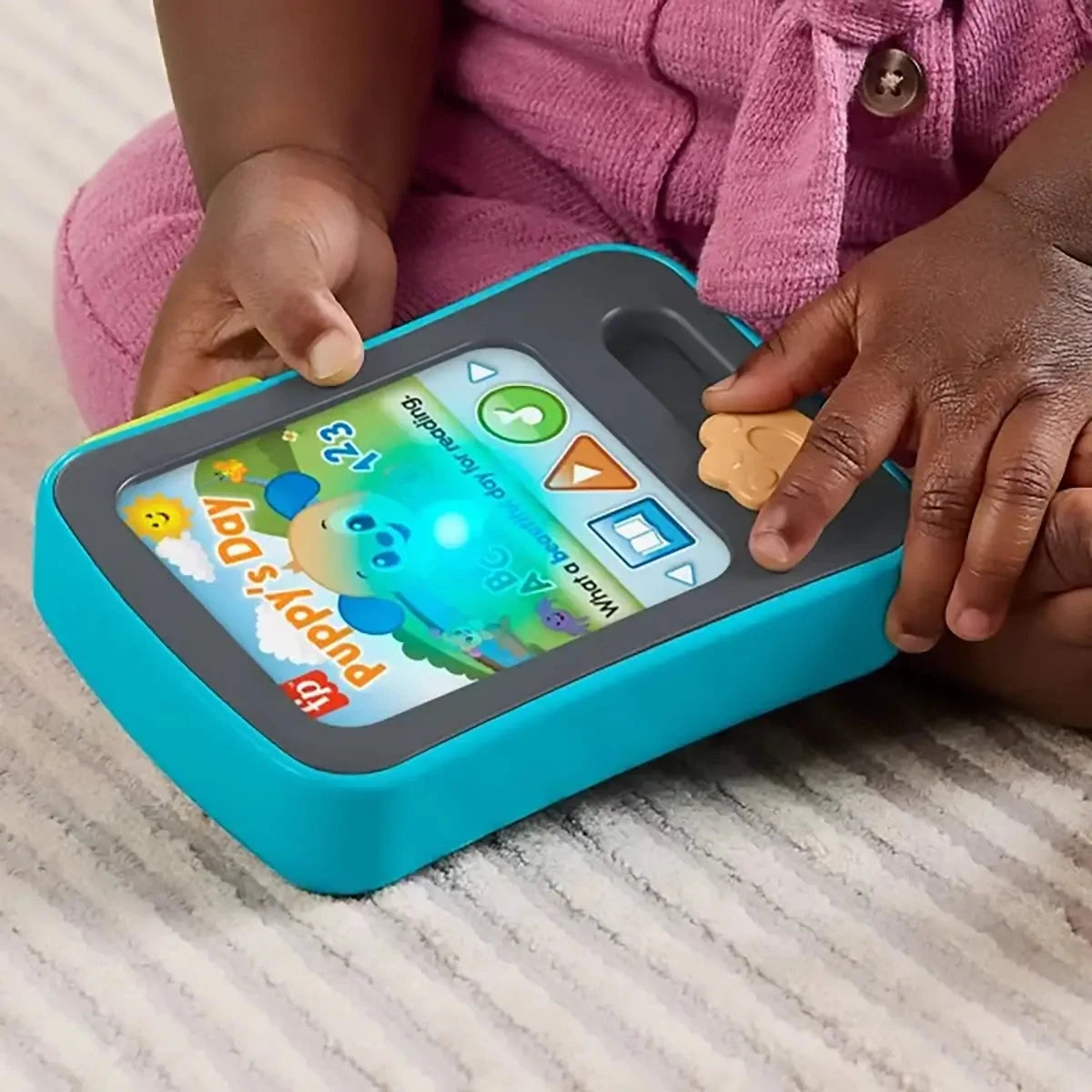 Fisher-Price Laugh & Learn Puppy's Storytime Reader Baby Electronic Learning Toy childs hands sliding