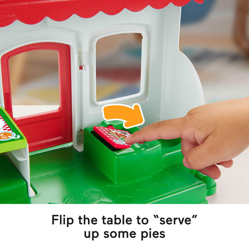 you can flip the table to serve at the Fisher-Price Little People We Deliver Pizza Place Playset
