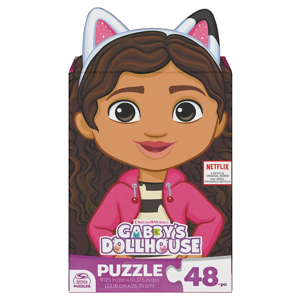Front view of the Gabby’s Dollhouse 48-piece puzzle box shaped like Gabby’s head with cat ears, highlighting the DreamWorks and Netflix branding for this children’s puzzle.