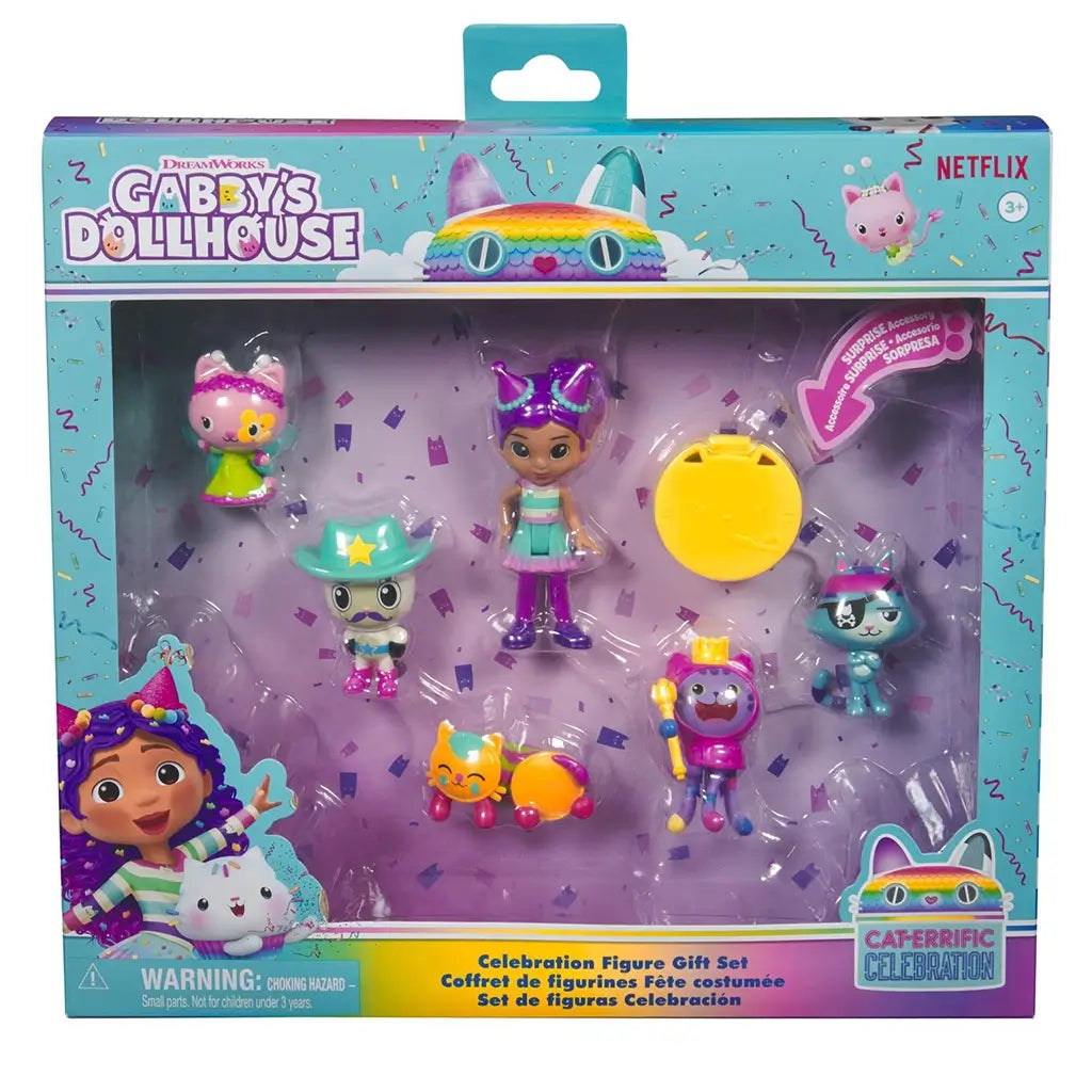 Gabby’s Dollhouse celebration figure gift set in teal cardboard and clear plastic display box featuring multicolor party-themed dolls and cat characters arranged against a purple confetti backdrop.
